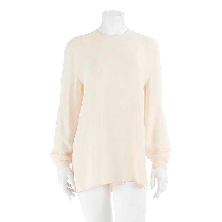 GIORGIO ARMANI, a créme colored silk blouse, size 42.