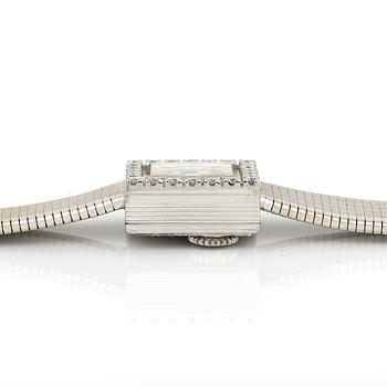 ARMBANDSUR, dam, 18K vitguld med briljantslipade diamanter, tot ca 0,72 ct, Omega. Total vikt ca 41 g.