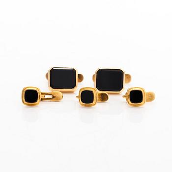 A pair of cufflinks and three shirt buttons,  18K gold and onyx.