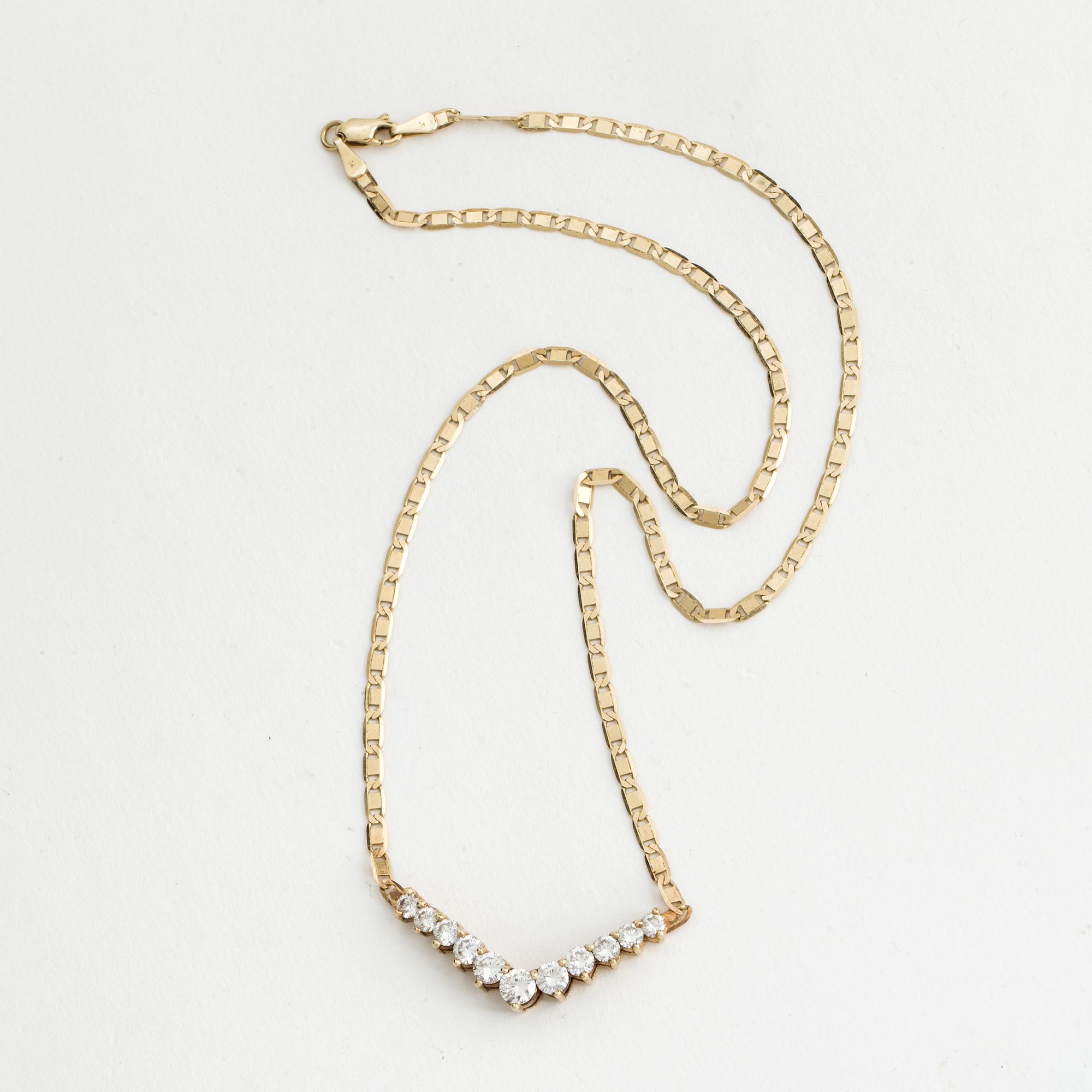 NECKLACE, 14K gold with 11 diamonds approx. 2.25 cts.