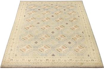 A Kazak carpet, c. 289 x 194 cm.