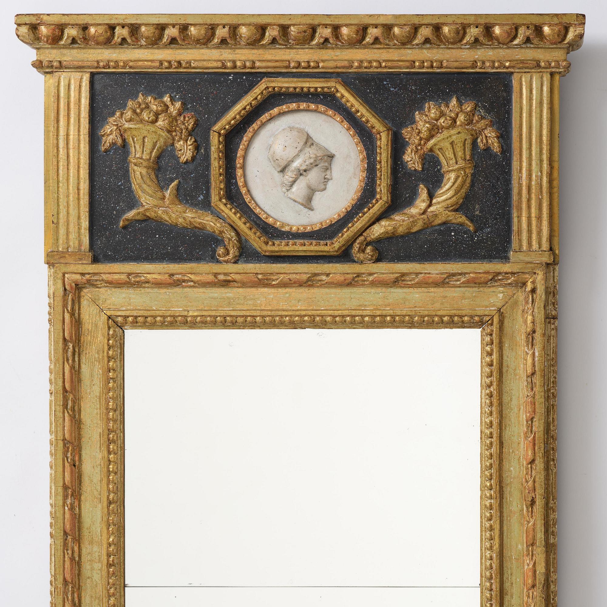 A late Gustavian giltwood mirror by E. Wahlberg (master in Stockholm ca 1760-1811).