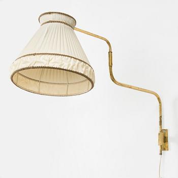 A mid-20th century wall light for Saariston Valaisin.