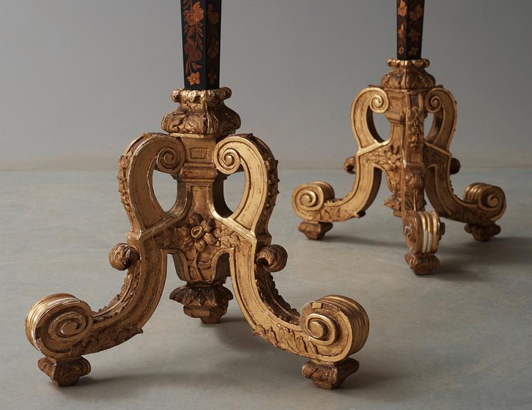 A pair of French Baroque circa 1700 candle stands.
