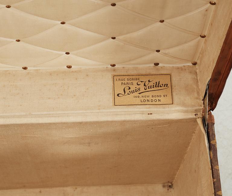 An early 20th cent monogram canvas trunk by Louis Vuitton.