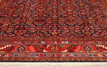 A semi-antique Lilian carpet, approx. 429 x 297 cm.