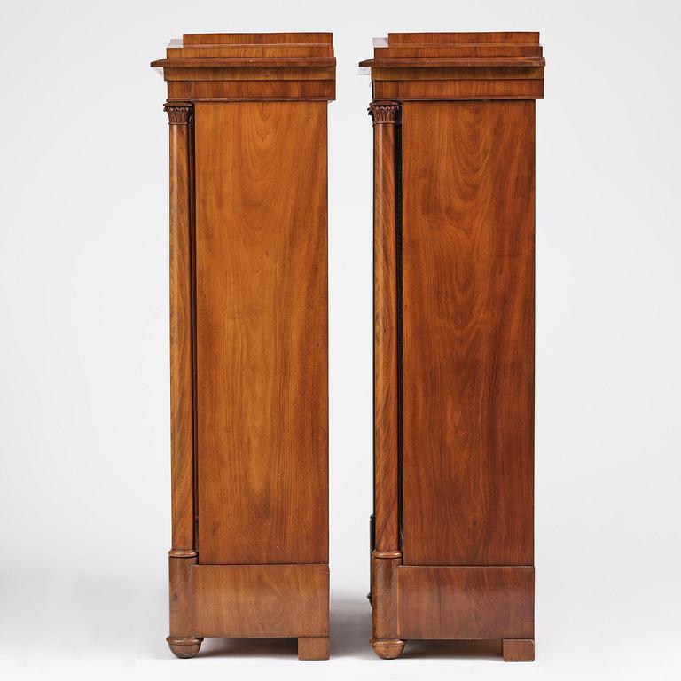 A pair of Swedish Empire mahogany bibliothèques, Stockholm, early 18th century.