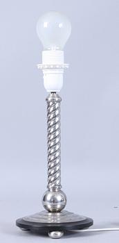 KANDELABRAR, ett par samt BORDSLAMPA, vitmetall, delvis Danmark, 1900-tal.