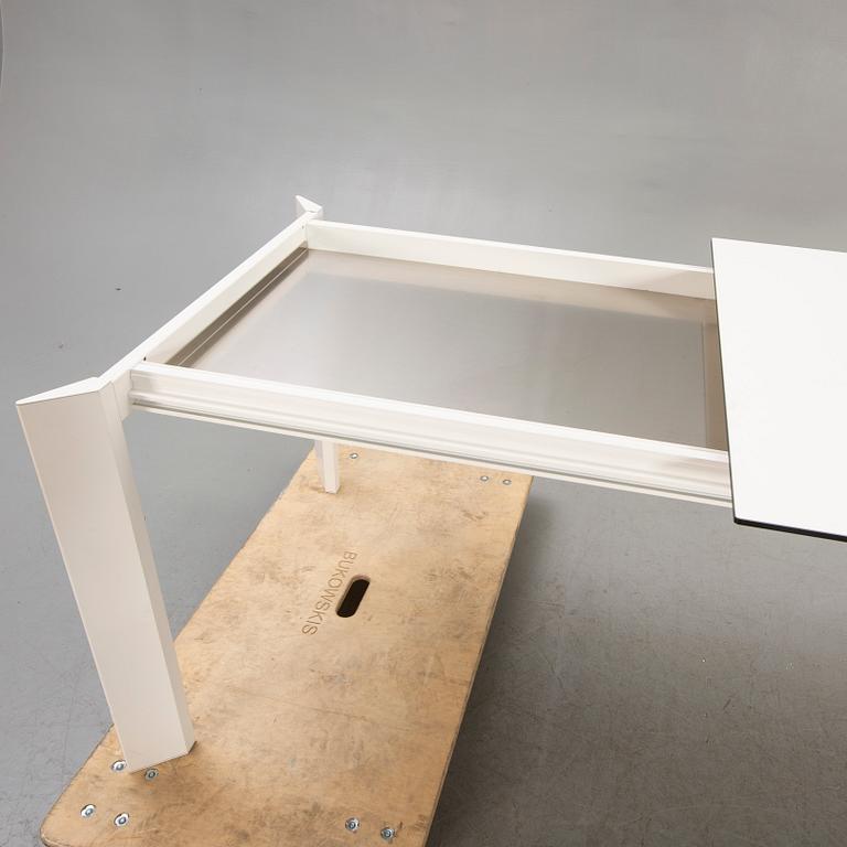 Caronni & Bonanomi, a "Every + Grid" dining table for Desalto 21st century.