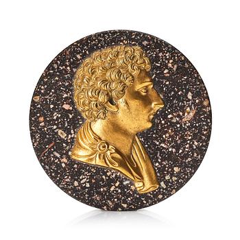 155. A Swedish porphyry paper weight with King Carl XIV Johan in profile.