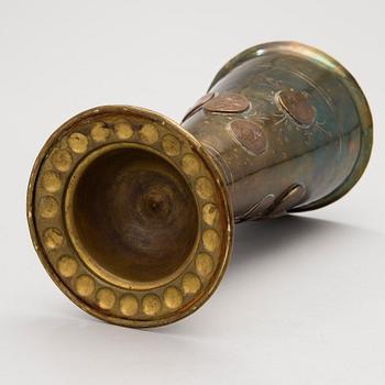A late 19th Century brass cup.