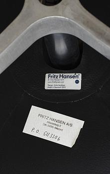 An Arne Jacobsen black leather 'Egg' chair, Fritz Hansen, Denmark 2007.