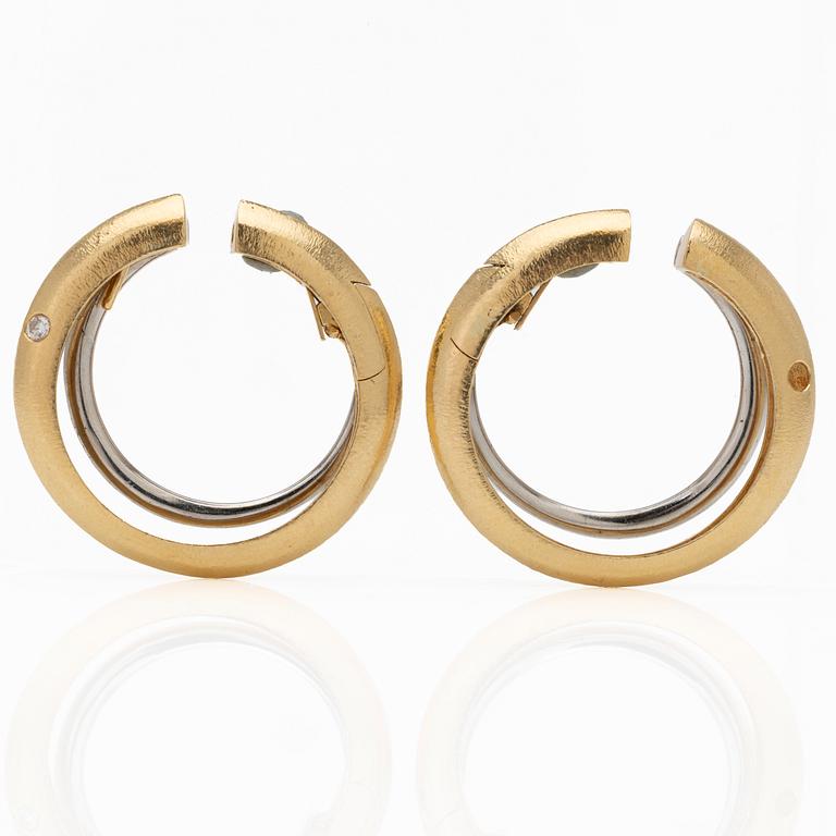 Ole Lynggaard, 18K gold and diamond hoop earrings.