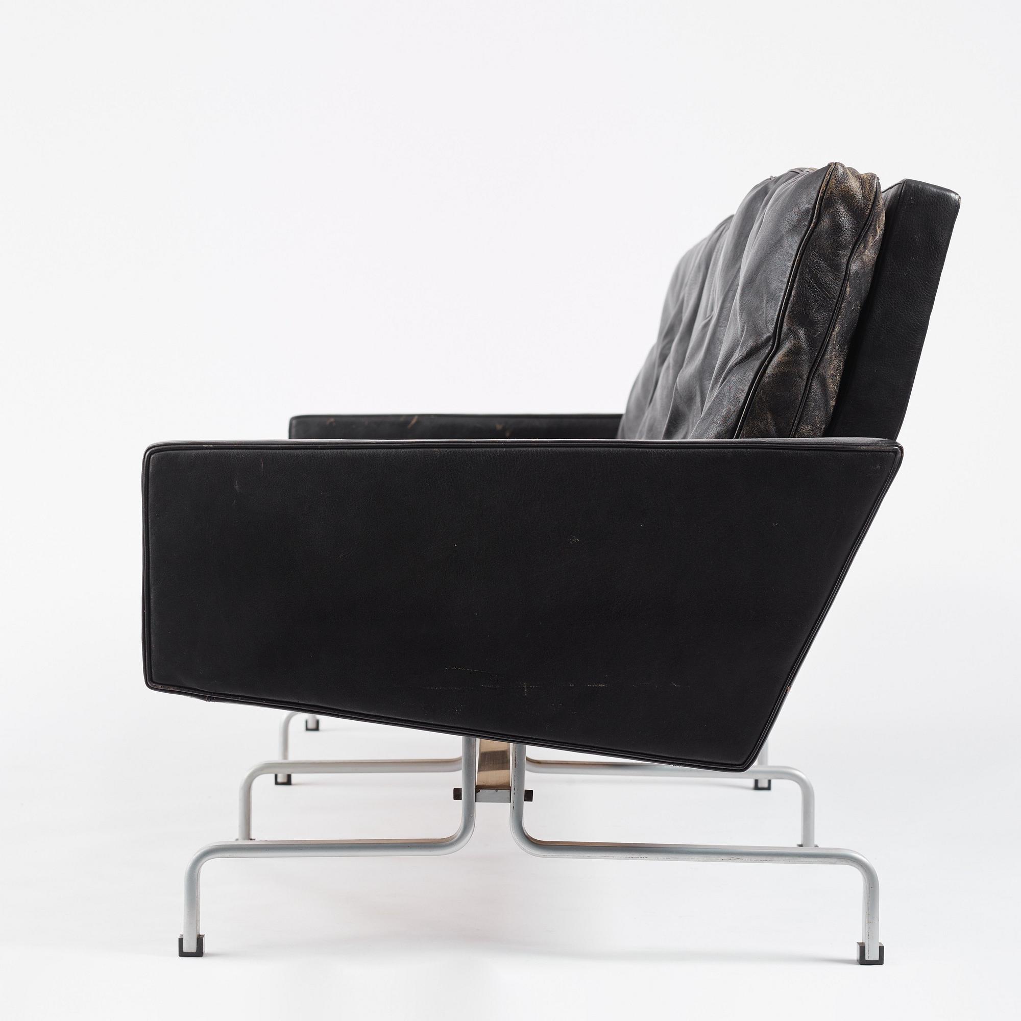 Poul Kjaerholm, a  'PK31-3' black leather sofa, edition E Kold Christensen, Denmark.