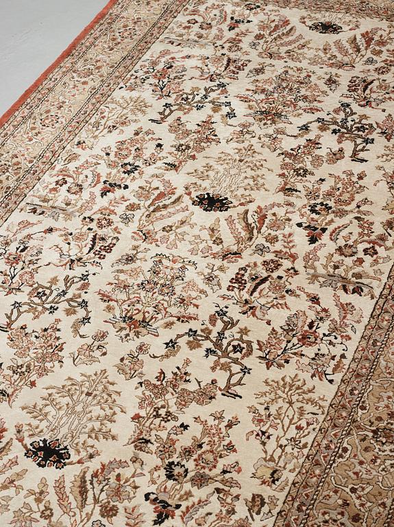 A chinese slik carpet, around 254 x 154 cm.