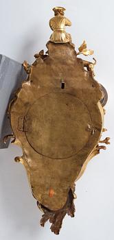 A Louis XV mid 18th century gilt bronze wall clock, "Chasse", in the style of J J de Saint Germain,
