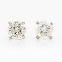 Earrings, single-stone earrings in white gold set with round brilliant-cut diamonds.