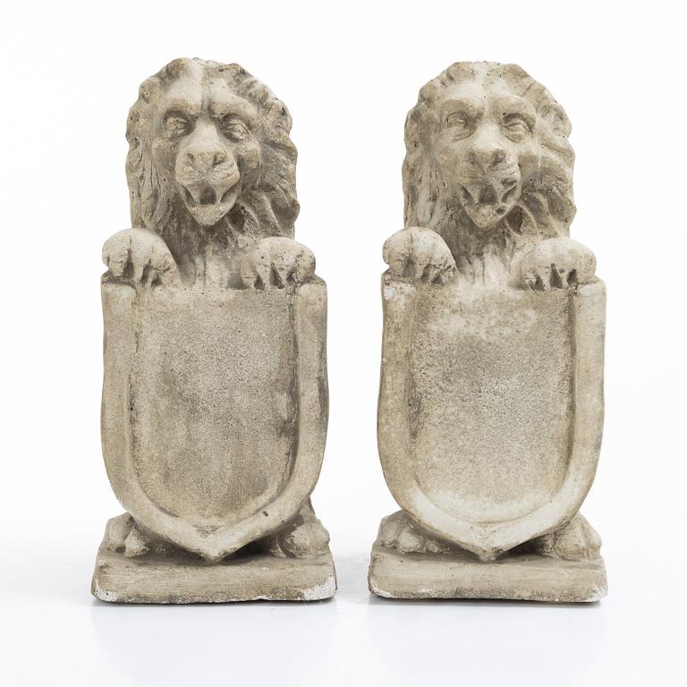 Bokstöd/skulpturer, ett par, 1900-tal.