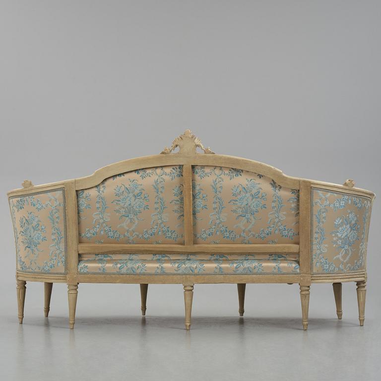 A grey-painted Gustavian 'canapé en corbeille'. sofa, by J E Höglander.