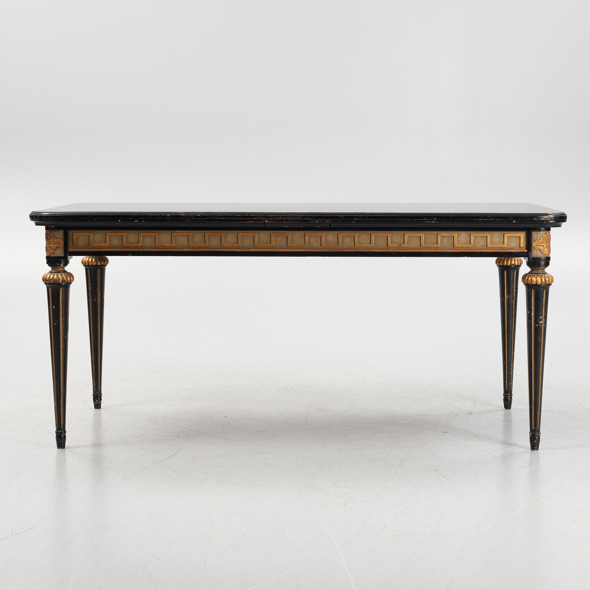 Dining table and 6 chairs, Louis XVI style. Early 20th century.
