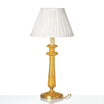 A French Empire ormolu bronze table lamp, early 19th century.