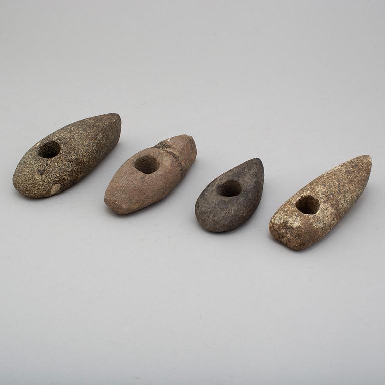 Four late neolithic stone axes.