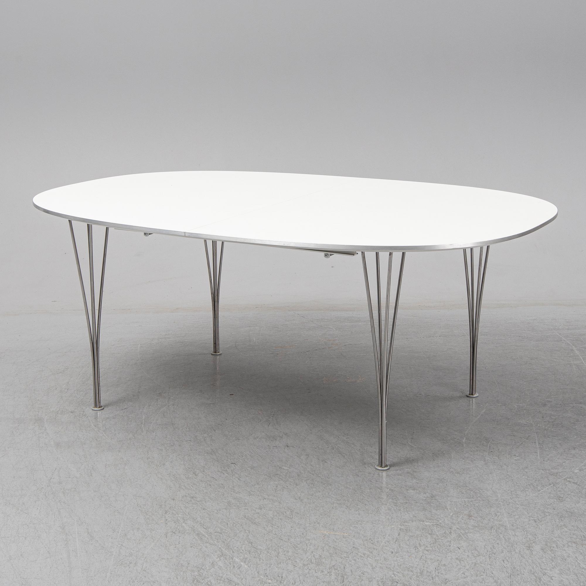 BRUNO MATHSSON & PIET HEIN, a 'Superellips' dining table, Fritz Hansen, Denmark.