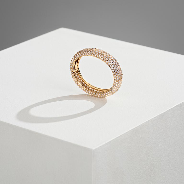 Cartier armring 18K guld med runda briljantslipade diamanter.