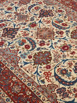 A old Esfahan carpet, around 299 x 210 cm.
