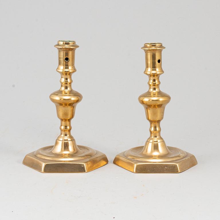 A pair of 17th century bronze candlesticks.