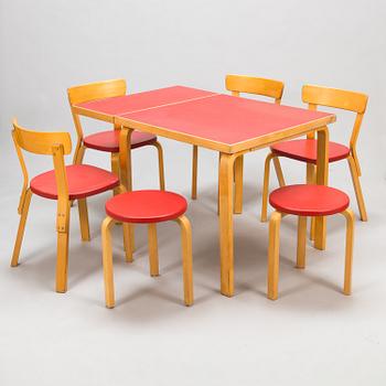 Alvar Aalto, a mid 20th century folding table, four chairs and two stools for Artek.