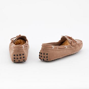 TOD'S, a pair of beige suede loafers.