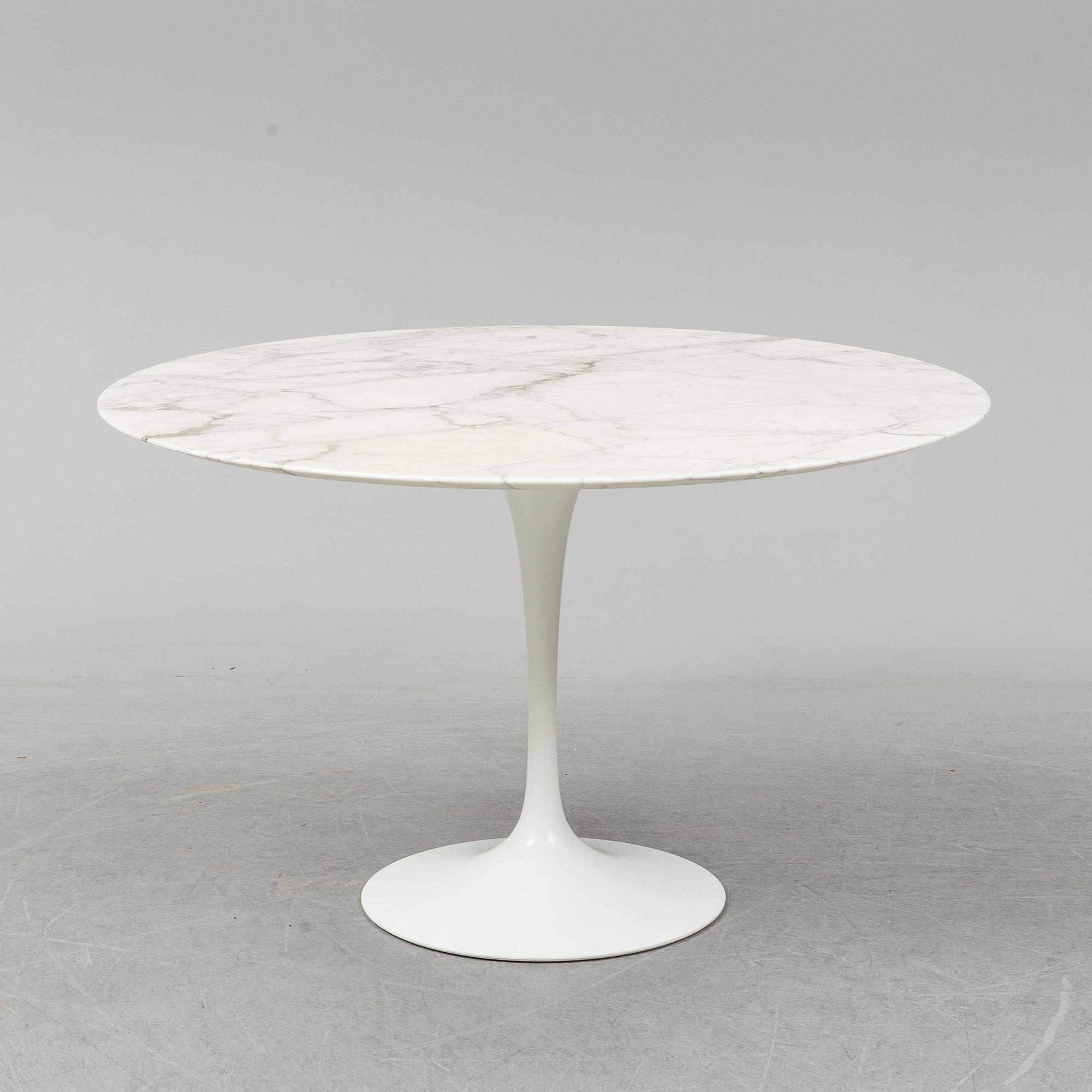EERO SAARINEN, a 'Tulip' table by Knoll.