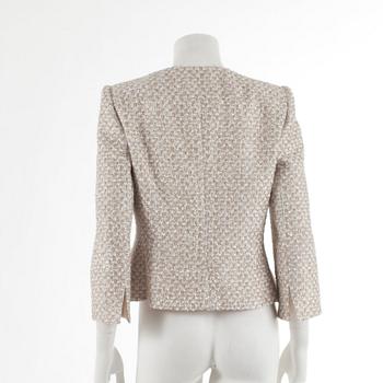 ARMANI, a silver and gold colored evening jacket. Italian size 44.