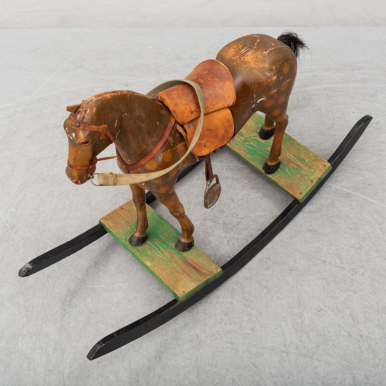 A first half of the 20th century wooden rocking horse.