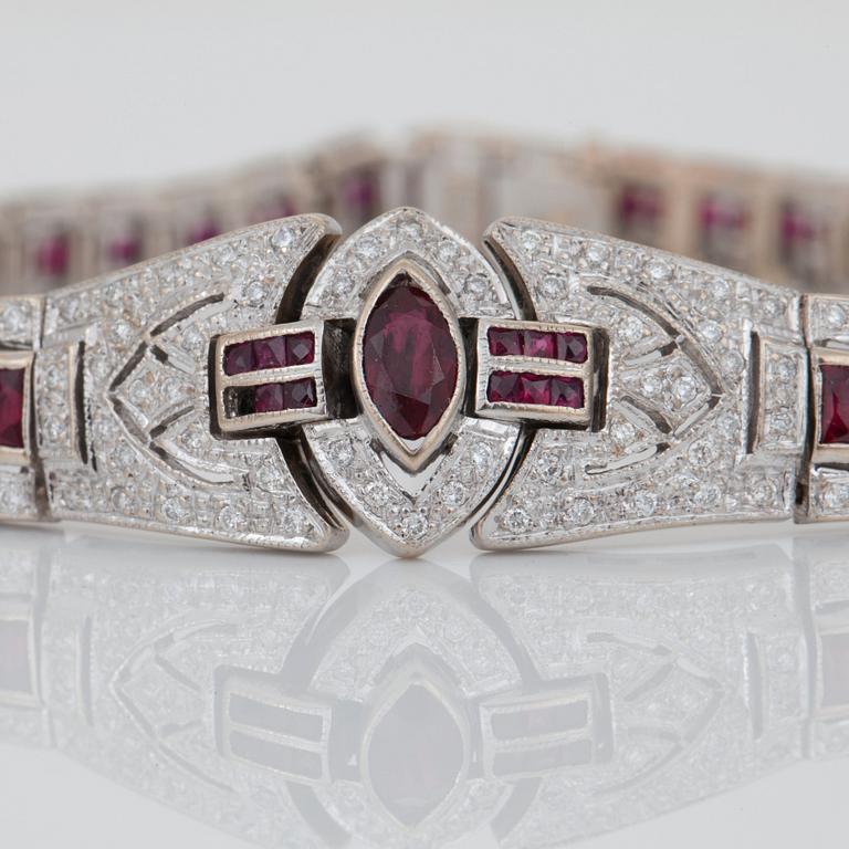 A brilliant-cut diamond and ruby bracelet.