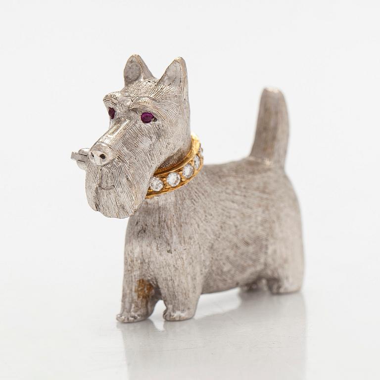 Rintaneula, 18K valkokultaa, sekä granaatteja ja briljanttihiottuja timantteja. BW&Co, Lontoo.