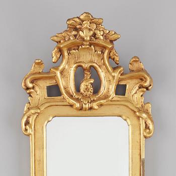 SPEGEL, gustaviansk, trol Carl Gustaf Fyrwald. Sign CG. Märkt med Stockholms hallstämpel samt dat 1775.