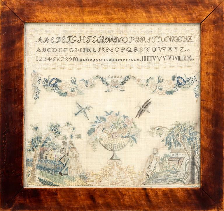 An embroidered sampler 19th century.