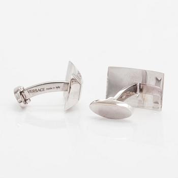 Versace, A pair of 18K white gold cufflinks with cubic zirkonia. Marked Versace, Made in Italy.