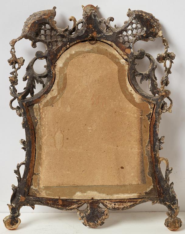 A gilt Rococo mirror, 18th Century.