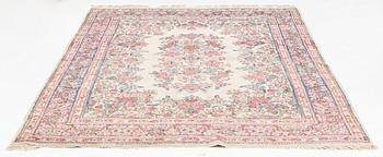 A Kirman carpet, old, c. 290 x 212 cm.