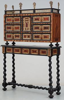 A Baroque 17/18th century cabinet, on later stand.
