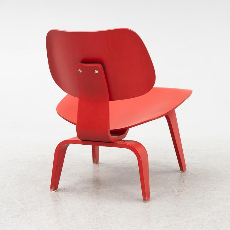 Charles & Ray Eames, a 'LCW' chair, Vitra, dated 2003.