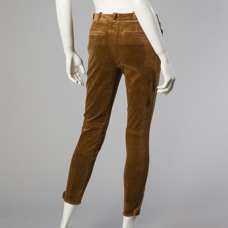 Three pair of trosers by Ralph Lauren.