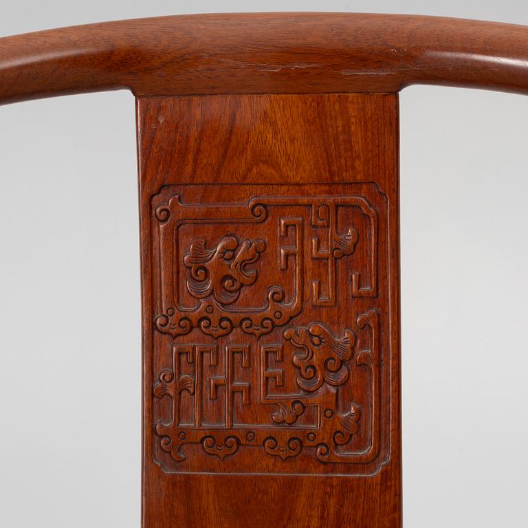 A pair of hardwood 'horse shoe back' hardwood armchairs, Hong Kong, 1960s.