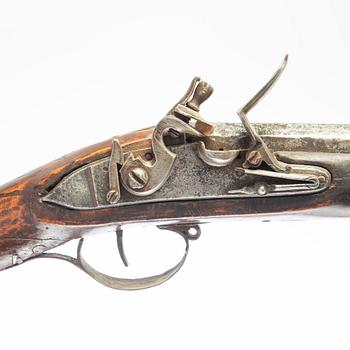 Flintlock gun, 19th century.