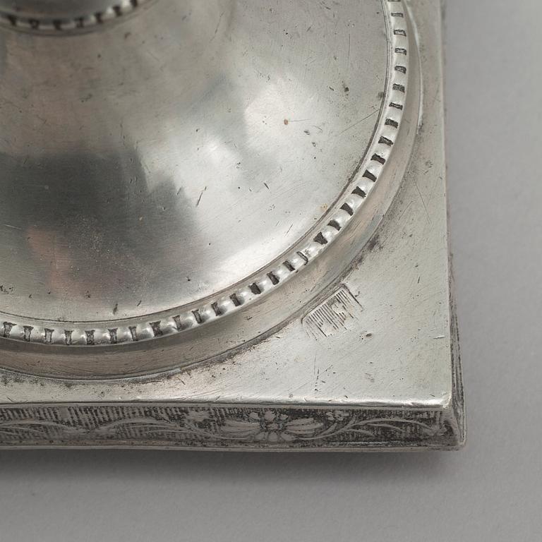 A pair of pewter candlesticks, probably by Gustaf Frederic Wigholm in Eskilstuna, first half of the 19th century.