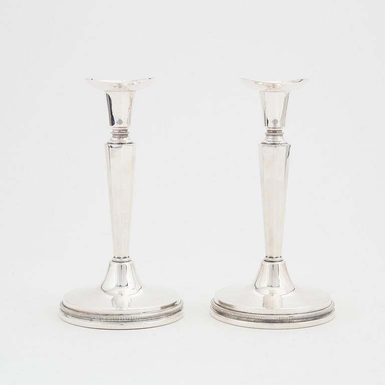 Eric Löfman, a pair of silver candlesticks, MGAB, Uppsala, 1976.