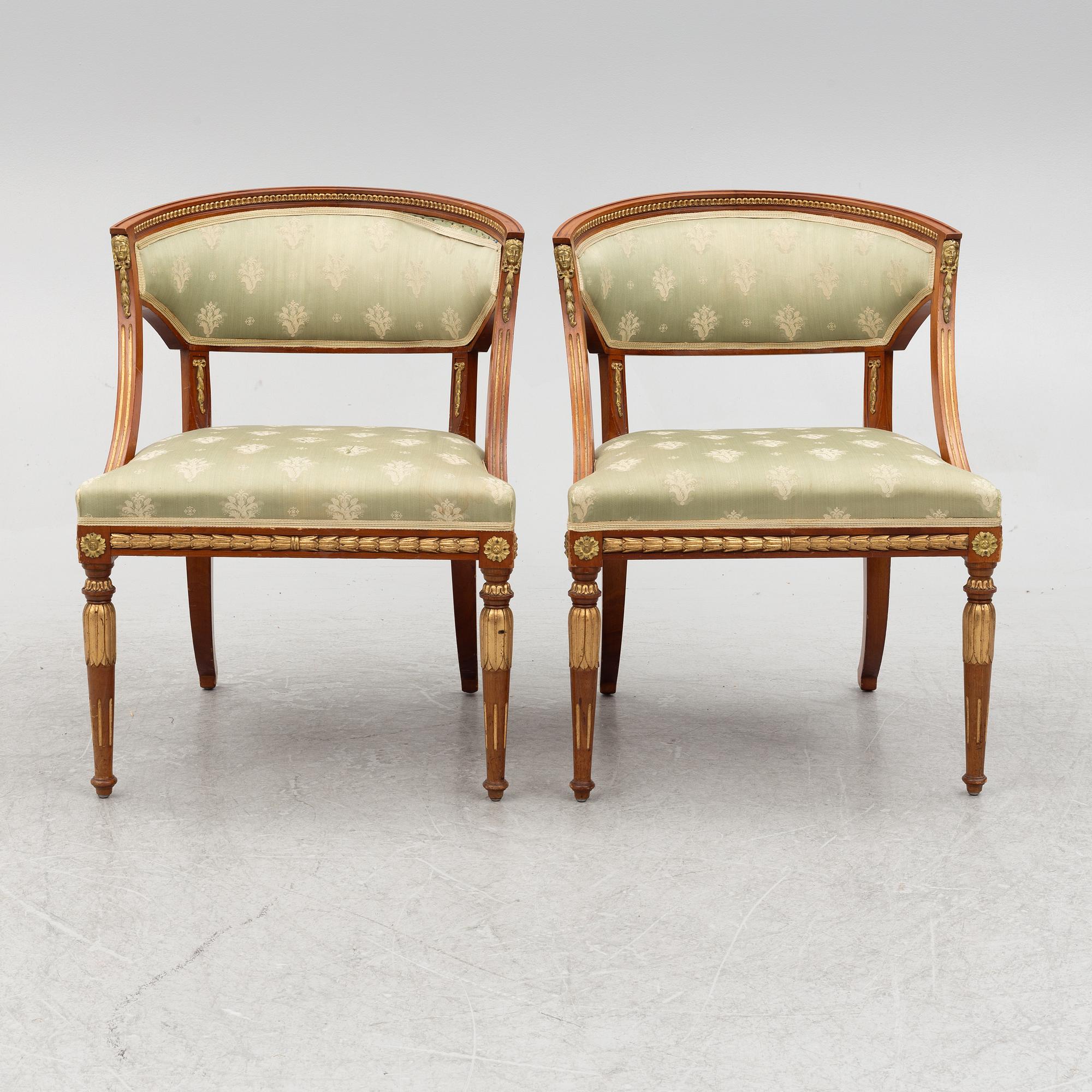 A pair of chairs, first half of the 20th century. Empire style.